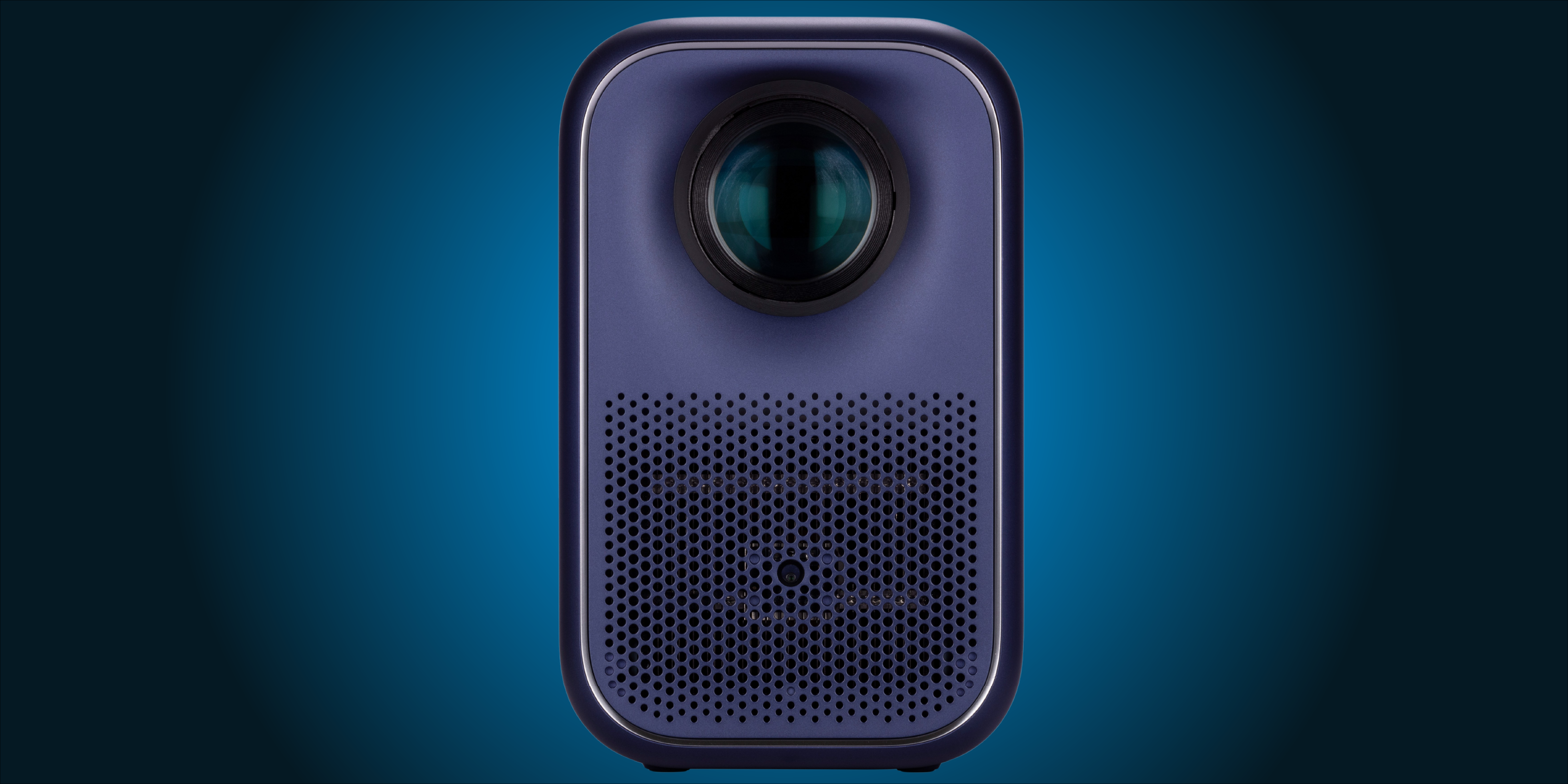 Front view of Apex Master blue portable projector on dark blue gradient background