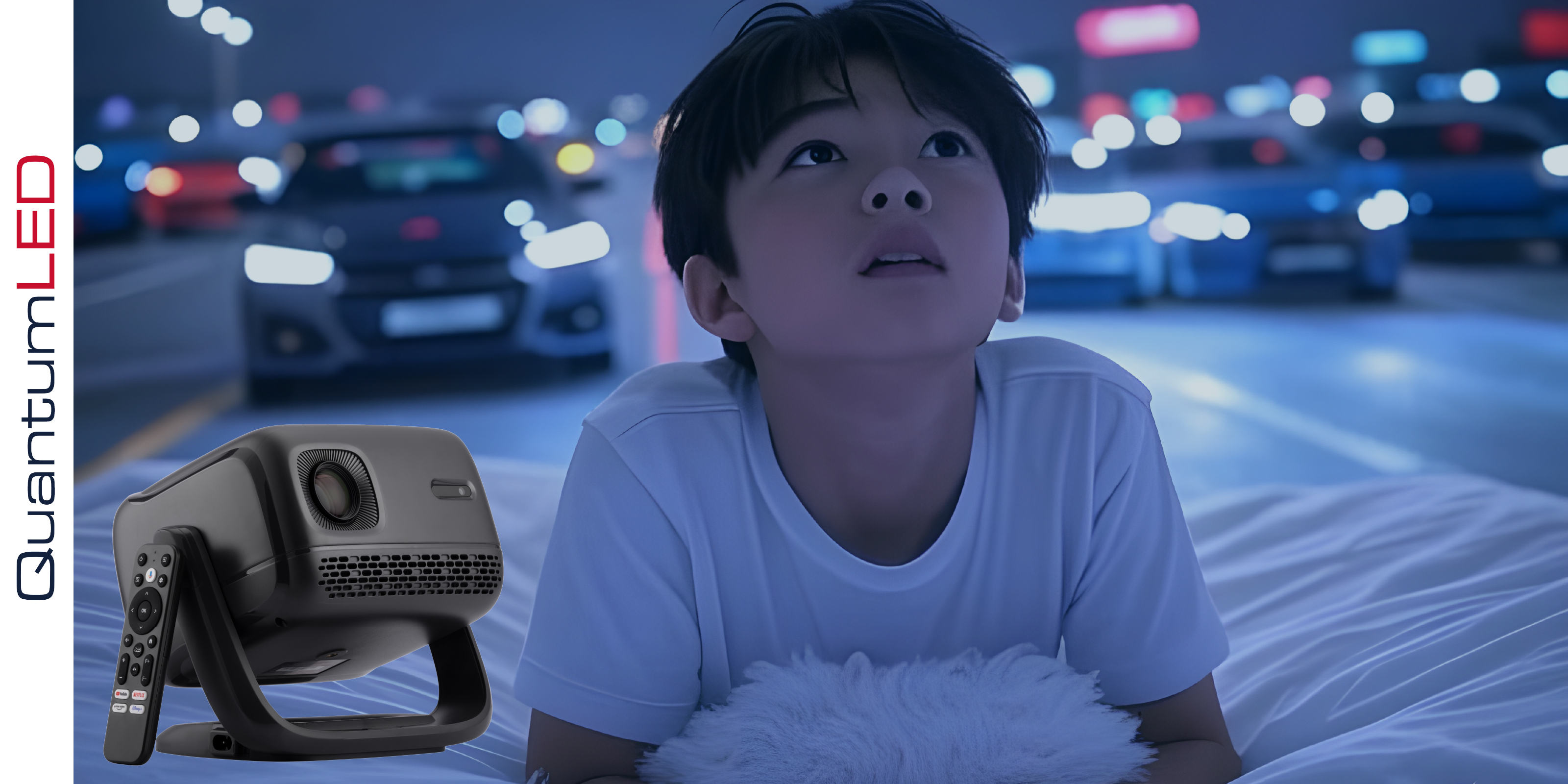 Child watching a movie on a portable projector with a night cityscape in the background.